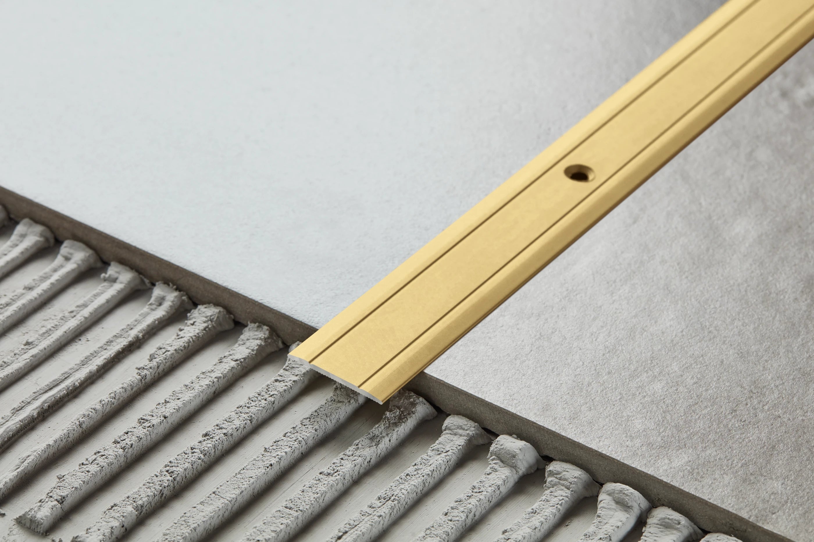 Profil progowy płaski aluminiowy 30mm Cezar Złoty Mat 0,90m