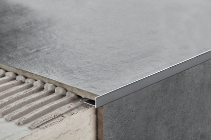 Profil do glazury aluminiowy narożny z krawędzią 10mmx18mm Cezar Srebrny El-Poler Połysk 2,50m